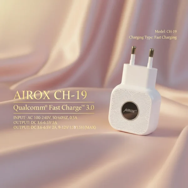 White Airox CH-19 Qualcomm Fast Charge 3.0 adapter with gold prongs on elegant pink fabric.