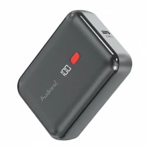 Dark grey Audionic Tesla T10 10000mAh power bank with digital display showing '100', red button, and Type-C port.