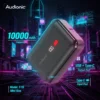 Audionic Tesla T10 10000mAh black power bank with USB-C ports on a cyberpunk neon background.