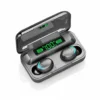 F9 Airdots Pro wireless earbuds in open charging power bank case, glowing and showing 100% digital display.