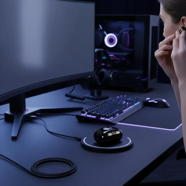 User inserting Mars MB-10 wireless earbud at gaming desk with wireless charging case, PC, and monitor.